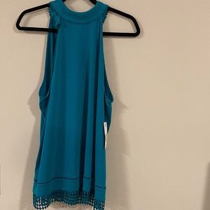 Brand new with tags Polynesian blue top by Worthington is a must have!